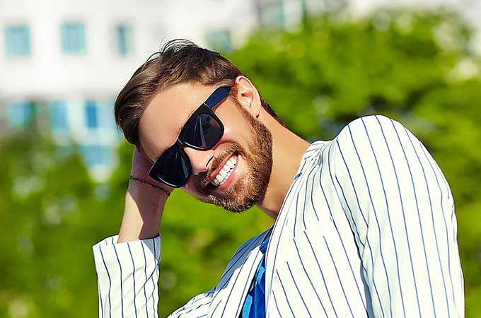 man in sunglasses smiling